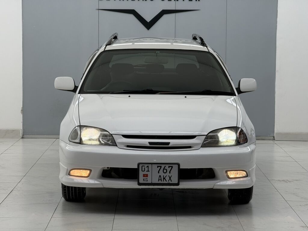 Продается универсал белого цвета с аэродинамическим обвесом и