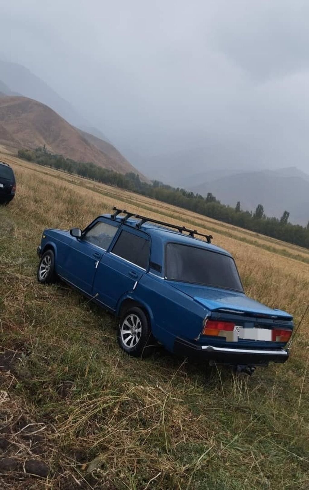 ВАЗ 2107, синий седан классической компоновки. Особенности и